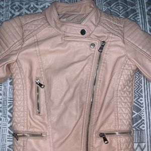 Blush pink leather jacket.